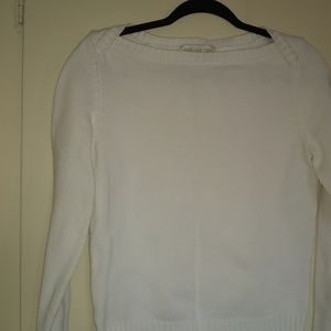 white sweater